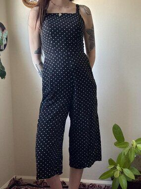 Black & white polka dot capri romper with shirred back and adjustable straps